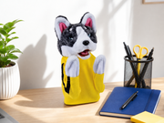 POWPAW punching husky toy standing on a desk